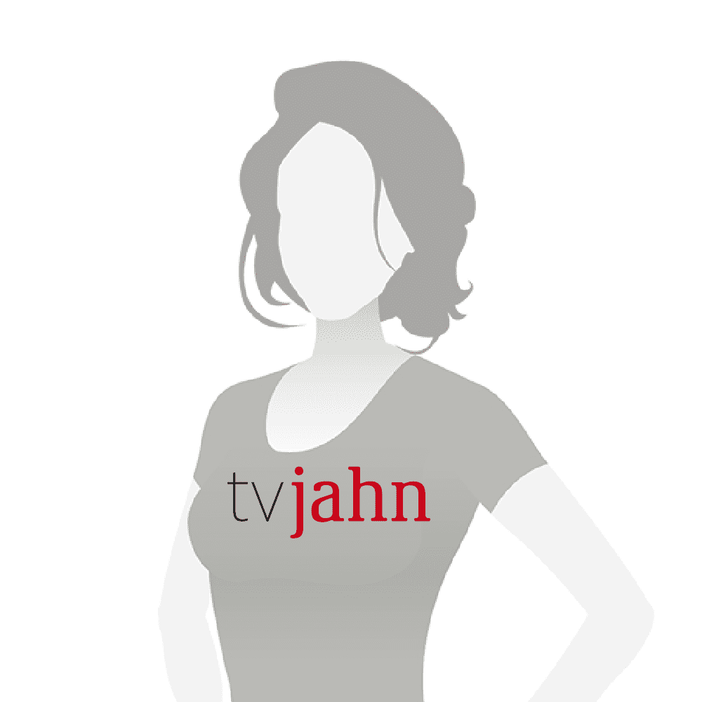 Silhouette einer Frau mit grauem Shirt und rotem Schriftzug &bdquo;tvjahn&ldquo; auf der Vorderseite.
